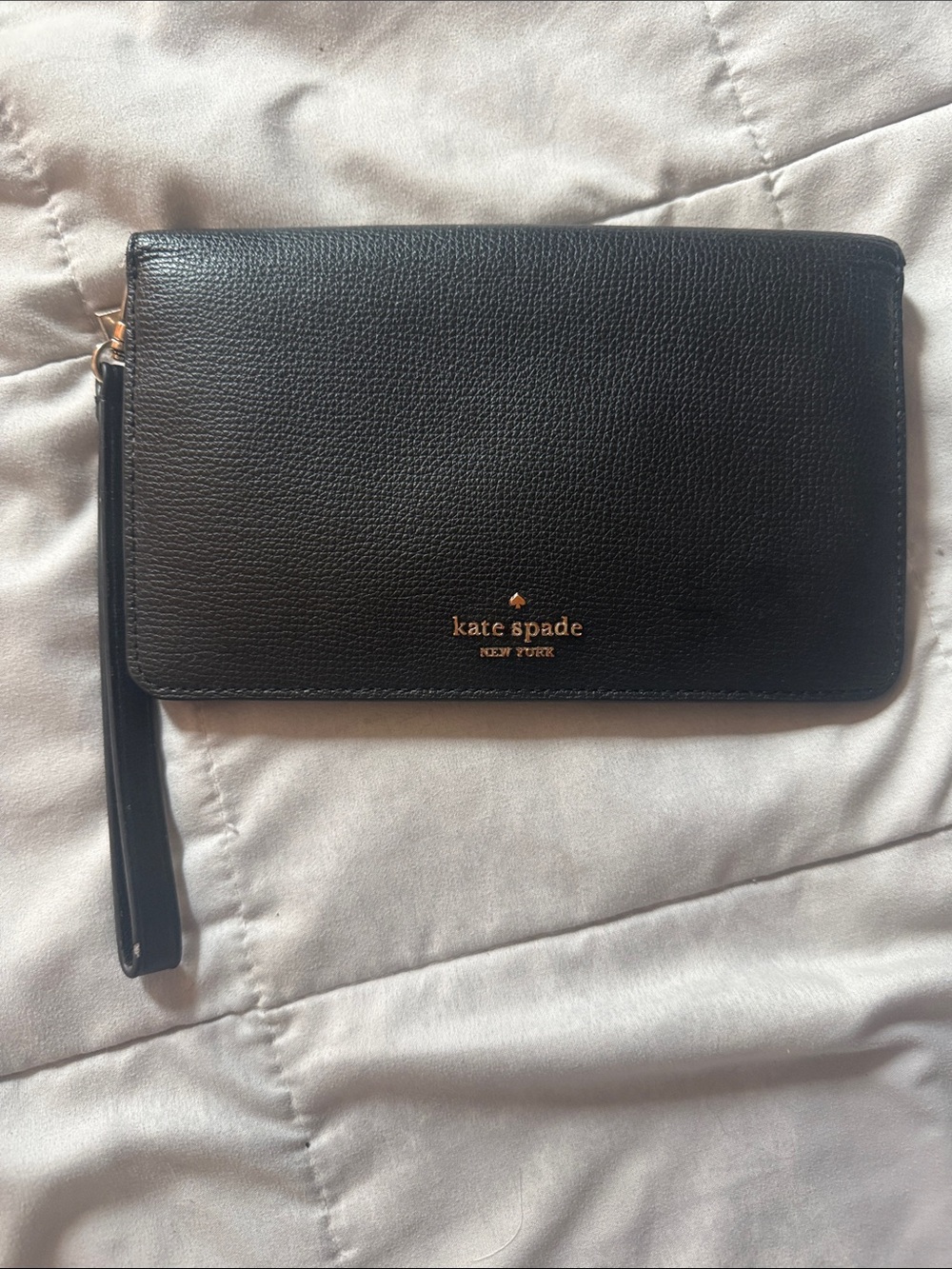 kate spade black leather zip wristlet with gold logo